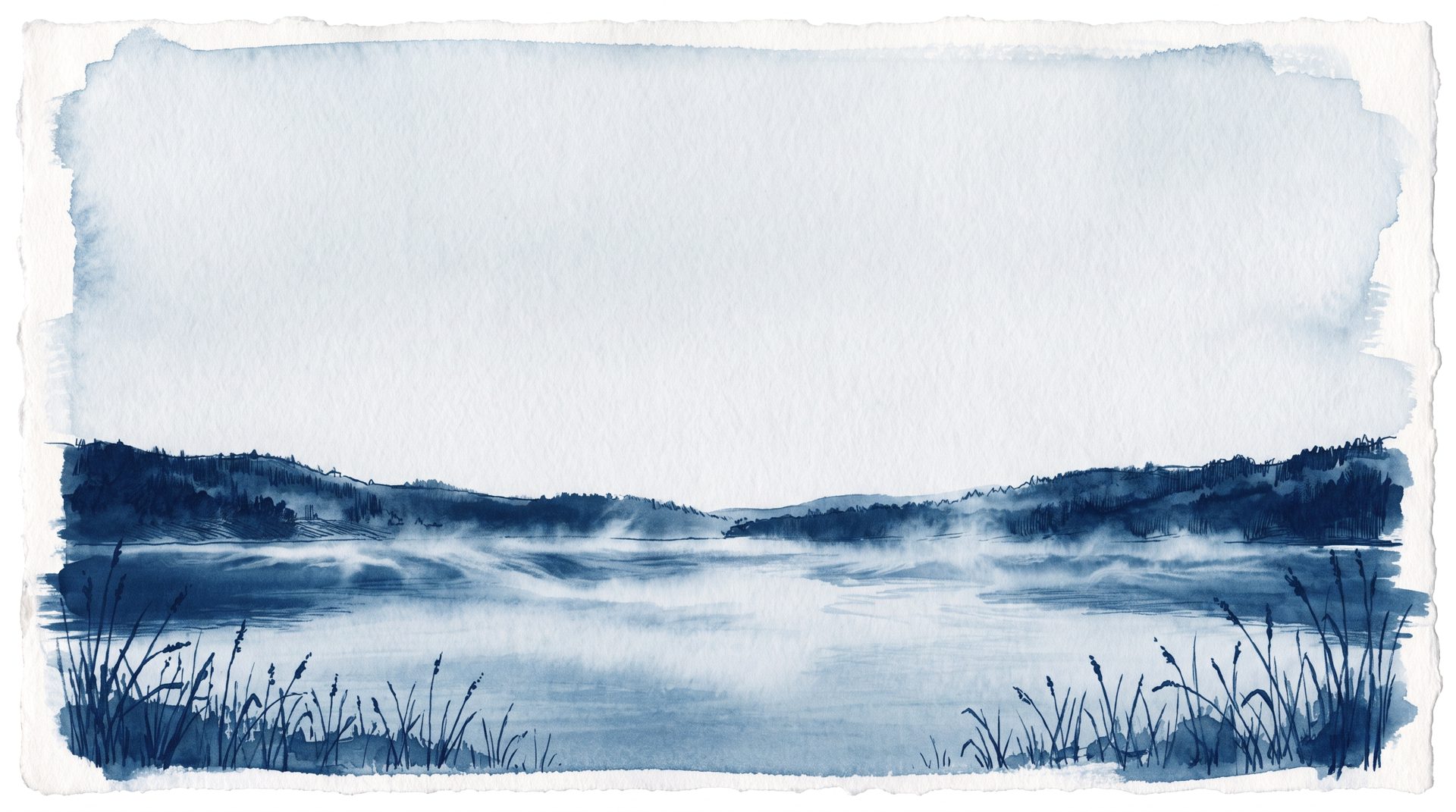 Cyanotype of a still lake in morning mist, a low wooded shore across the water and reeds along the near edge.